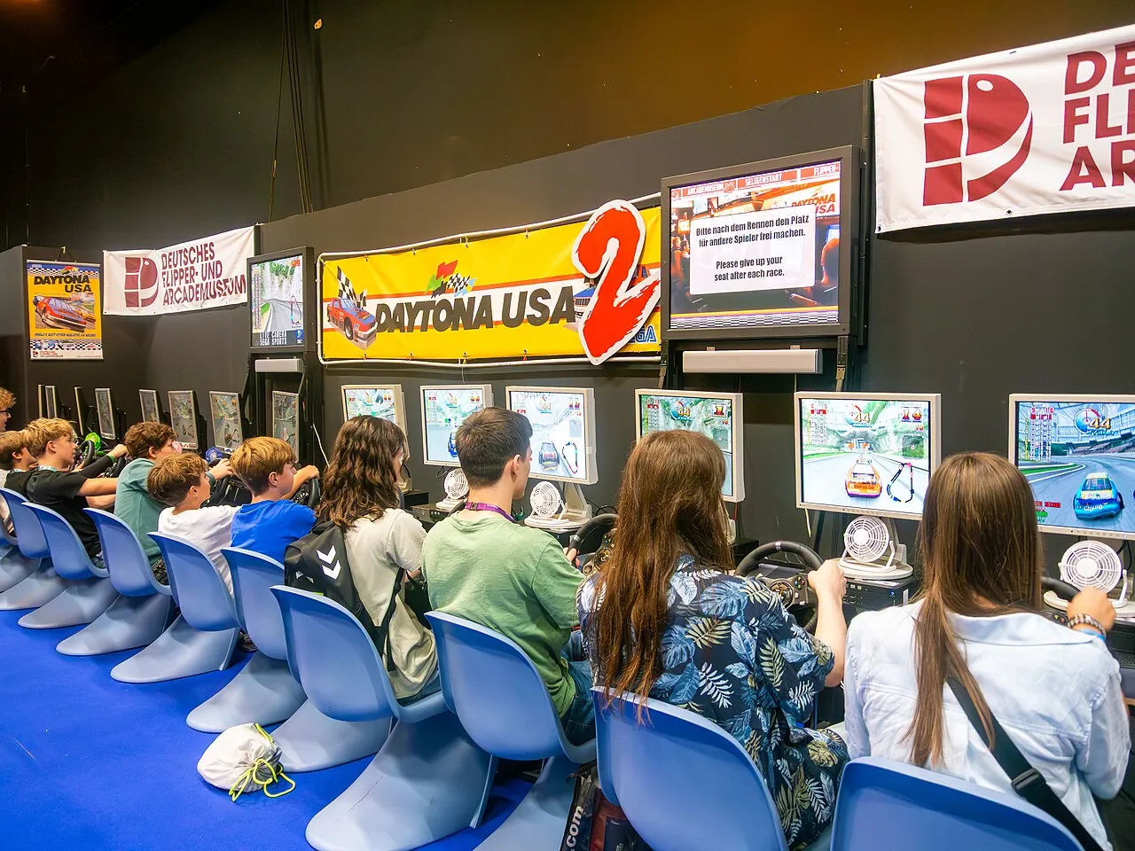 Attendees of gamescom 2026 play Daytona USA 2, a game from 1998. Older games like this one are just what WikiProject Video Games is trying to preserve before they vanish.
